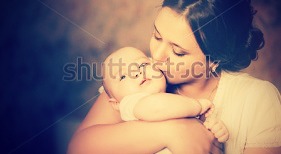stock-photo-young-mother-kissing-her-little-newborn-baby-137703866[1].jpg
