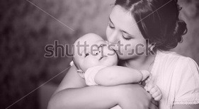 stock-photo-young-mother-kissing-her-little-newborn-baby-137703866[4].jpg